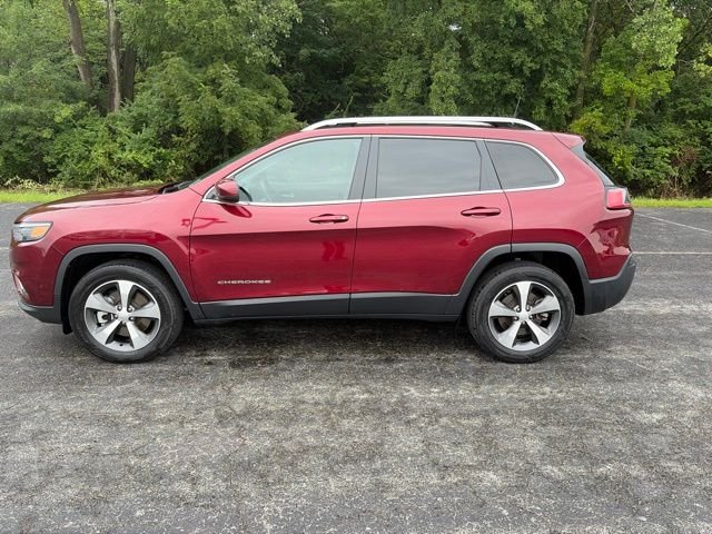 Used 2021 Velvet Red Pearlcoat Jeep Limited image 1