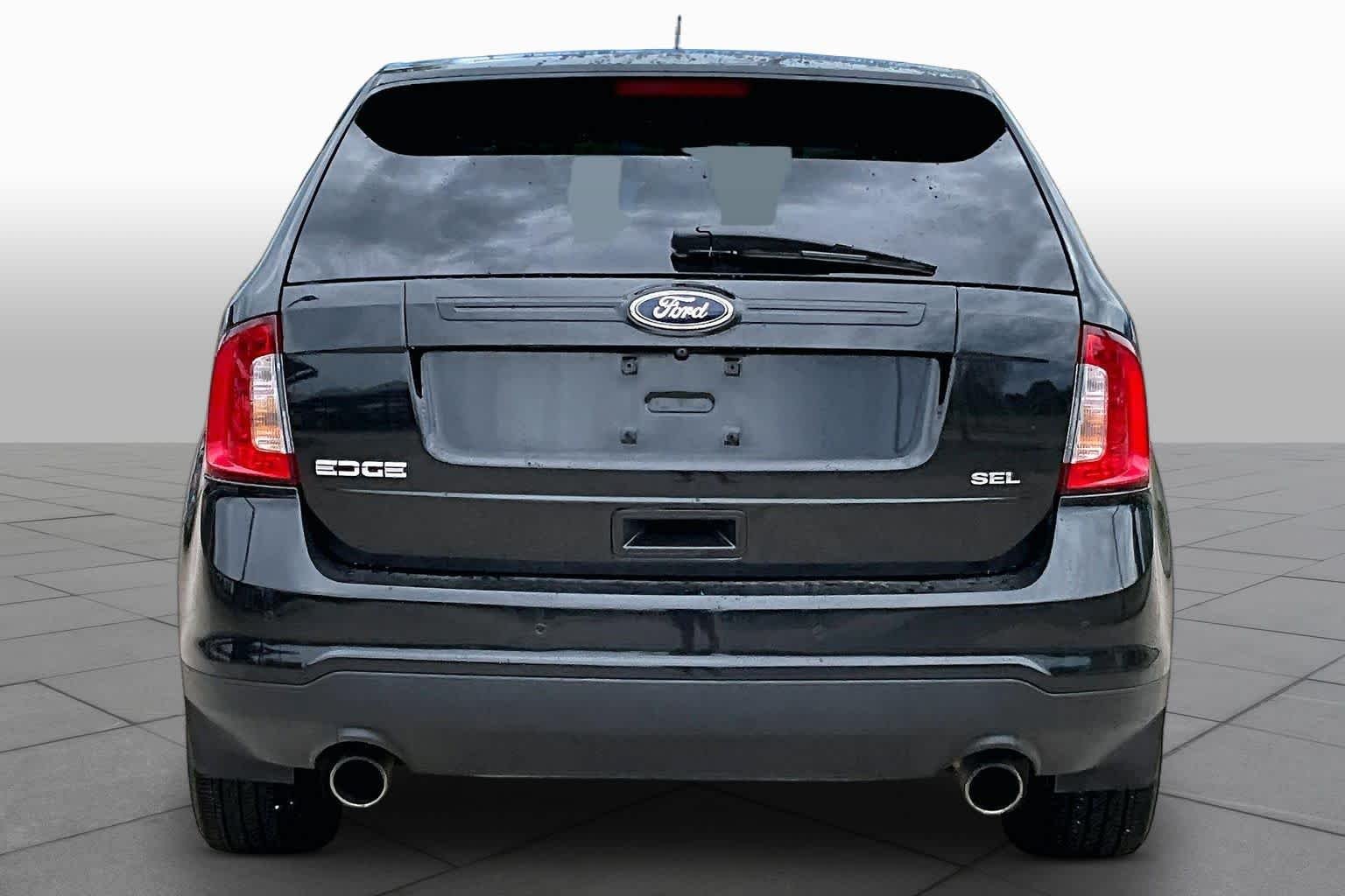 Used 2012 Tuxedo Black Metallic Ford SEL image 5