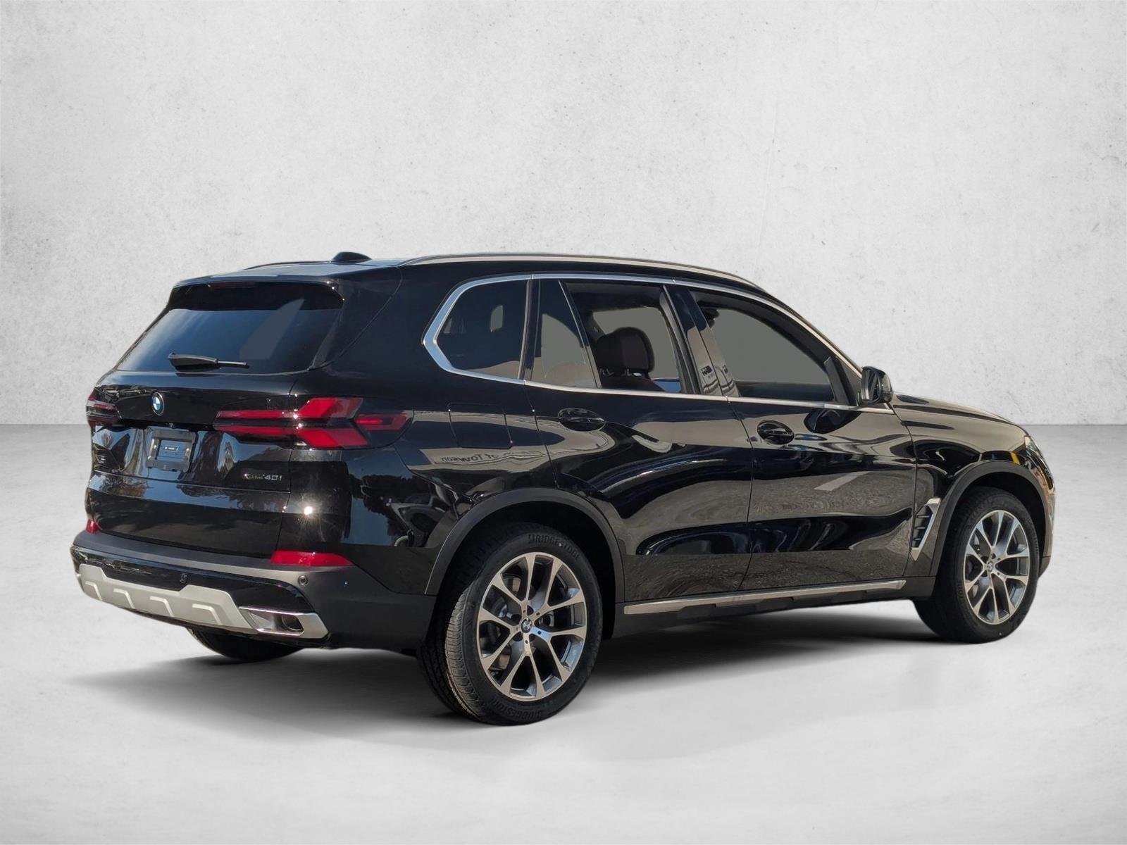 Used 2026 Black Sapphire Metallic BMW xDrive40i image 2