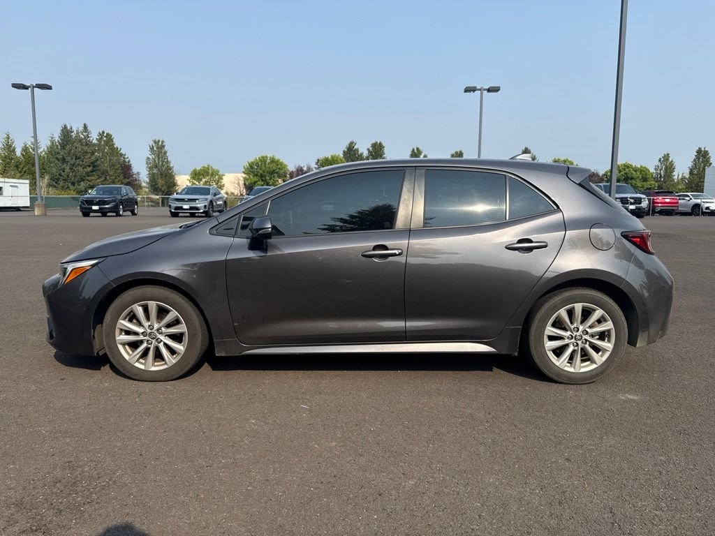 Used 2023 Magnetic Gray Metallic Toyota SE image 4
