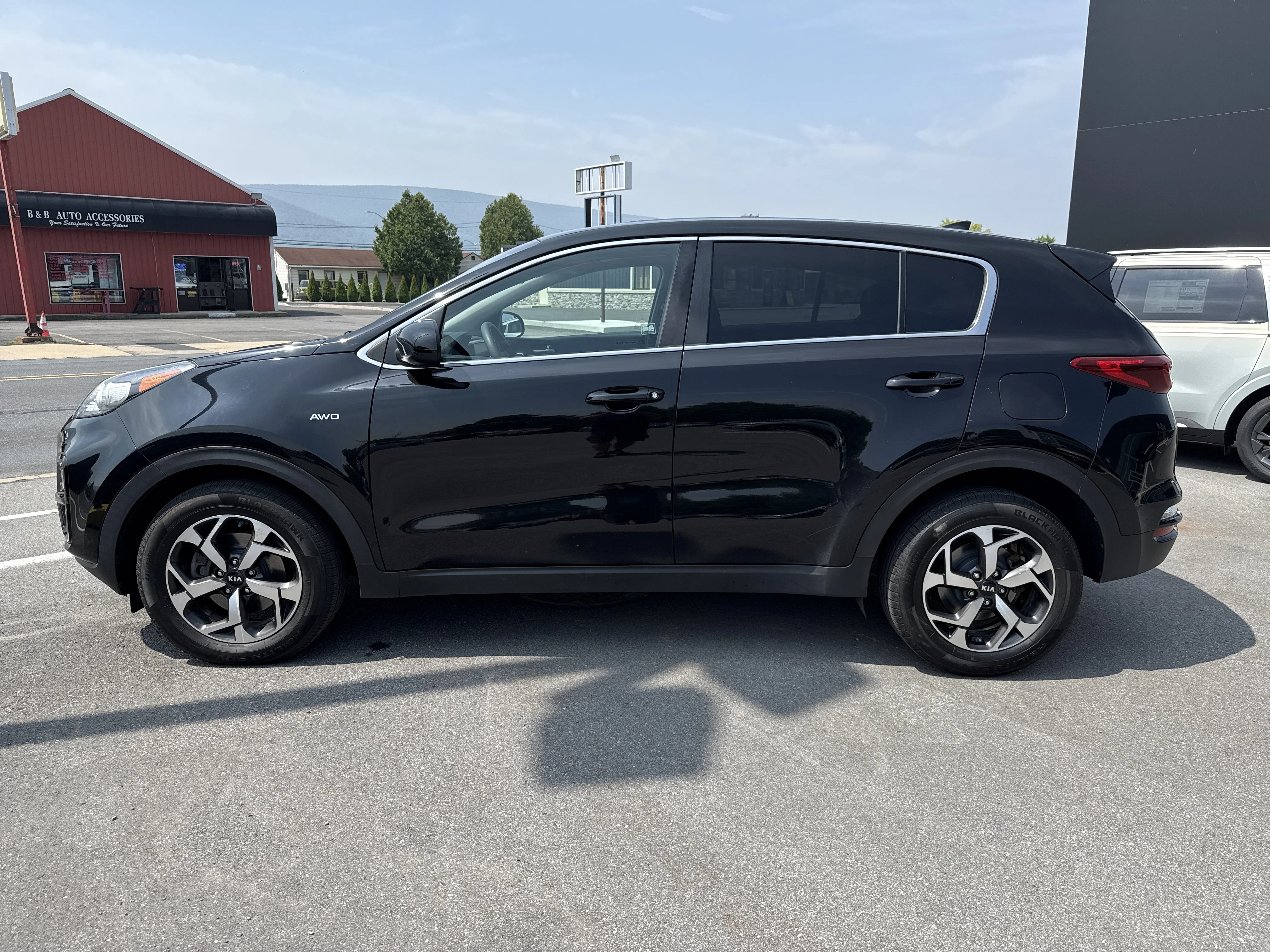 Used 2020 Black Cherry Pearl Kia LX image 7