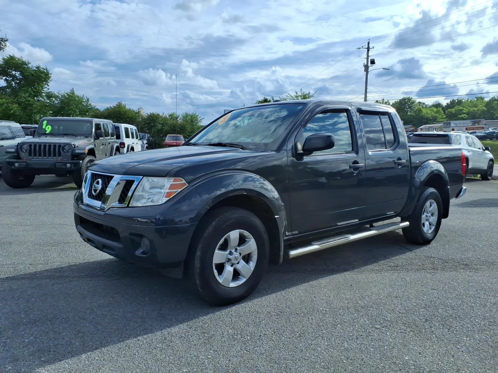 2012 Nissan Frontier 4.0 SV Crew Cab 4X4 AT SWB's photo