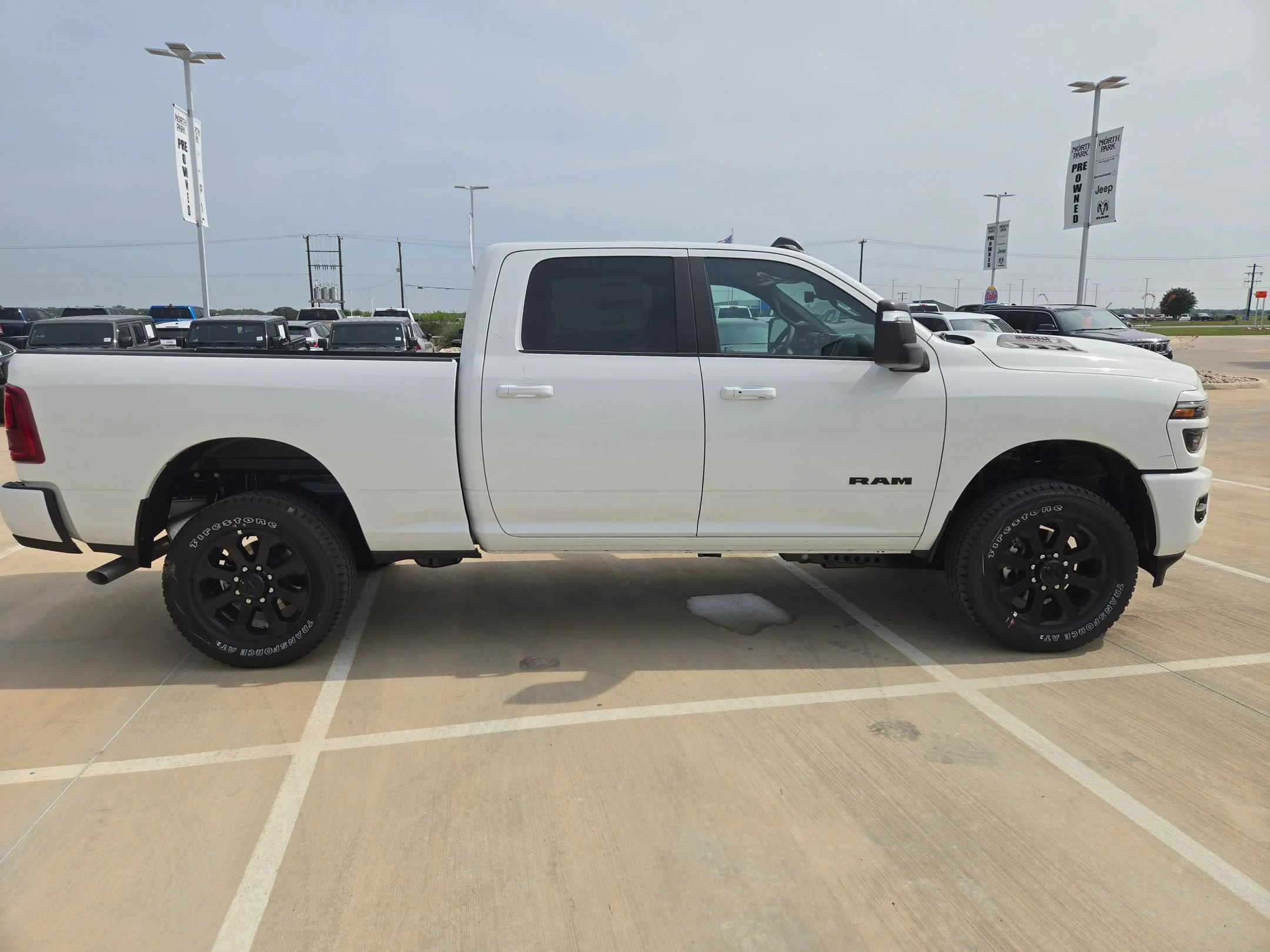 New 2026 Bright White Clear-Coat Exterior Paint RAM Laramie image 2