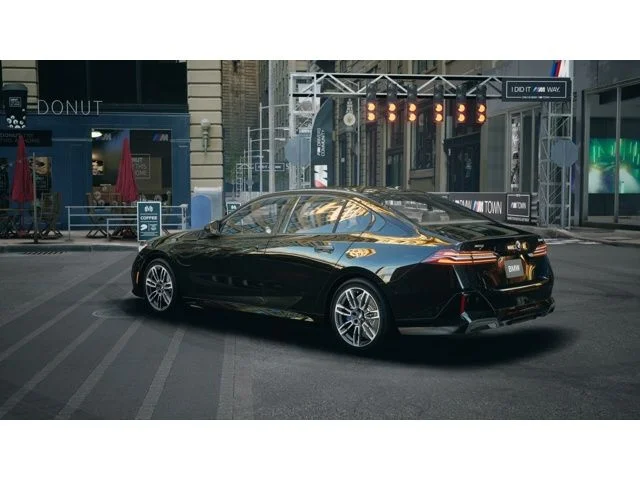 Used 2026 Black Sapphire Metallic BMW 550e xDrive image 2