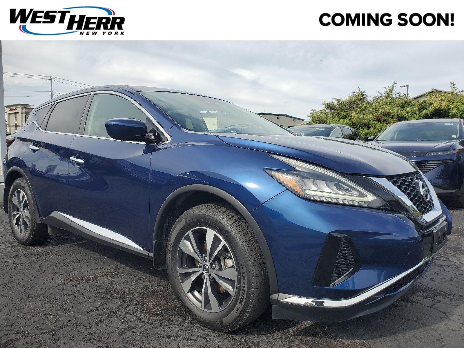 Used 2022 Deep Blue Pearl Nissan S image 1