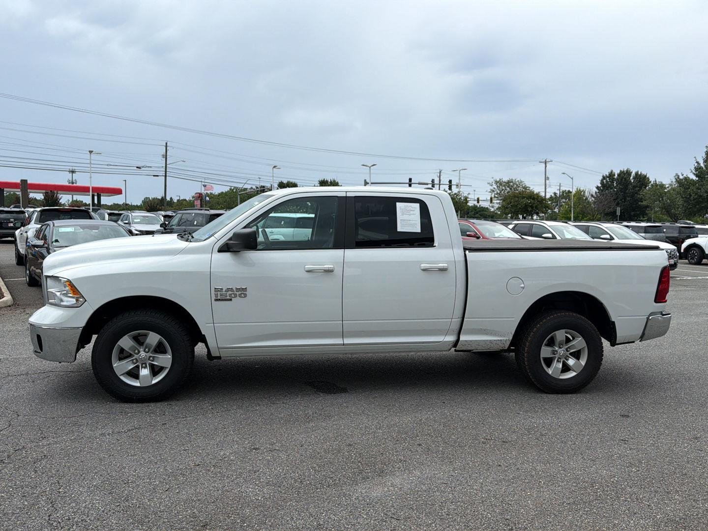 Used 2019 Bright White Clearcoat Ram SLT image 5