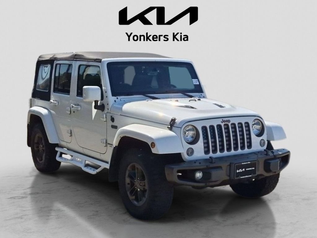 Used 2016 White Jeep Unlimited Sahara image 3