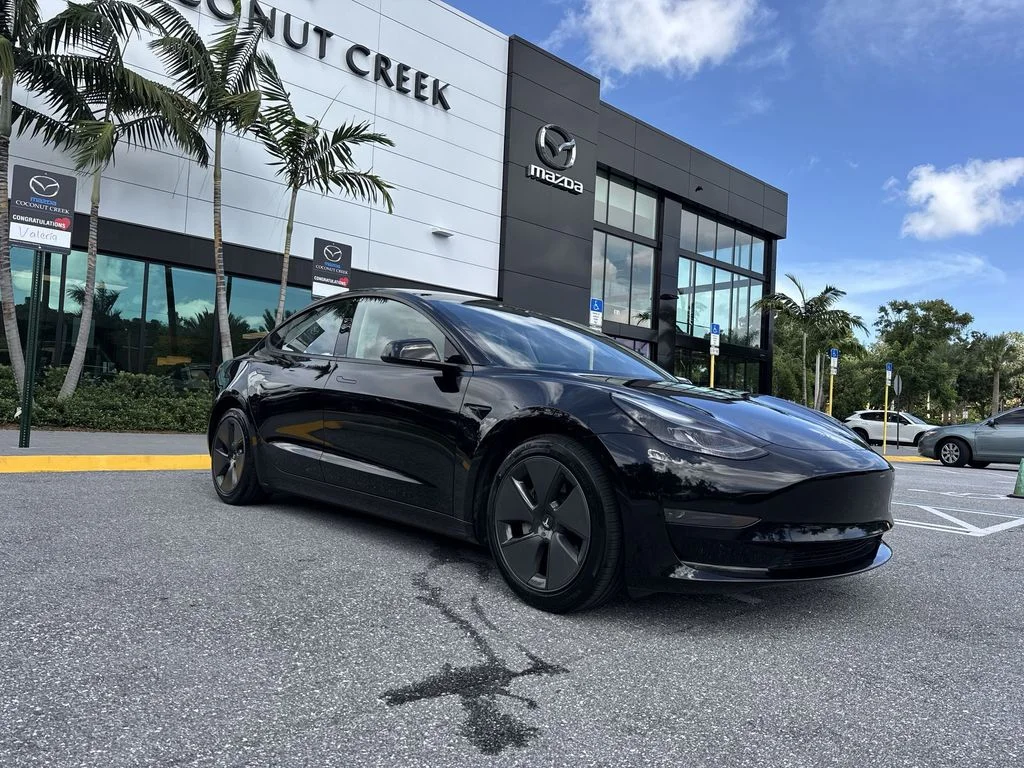 Used 2023 Solid Black Tesla  image 22