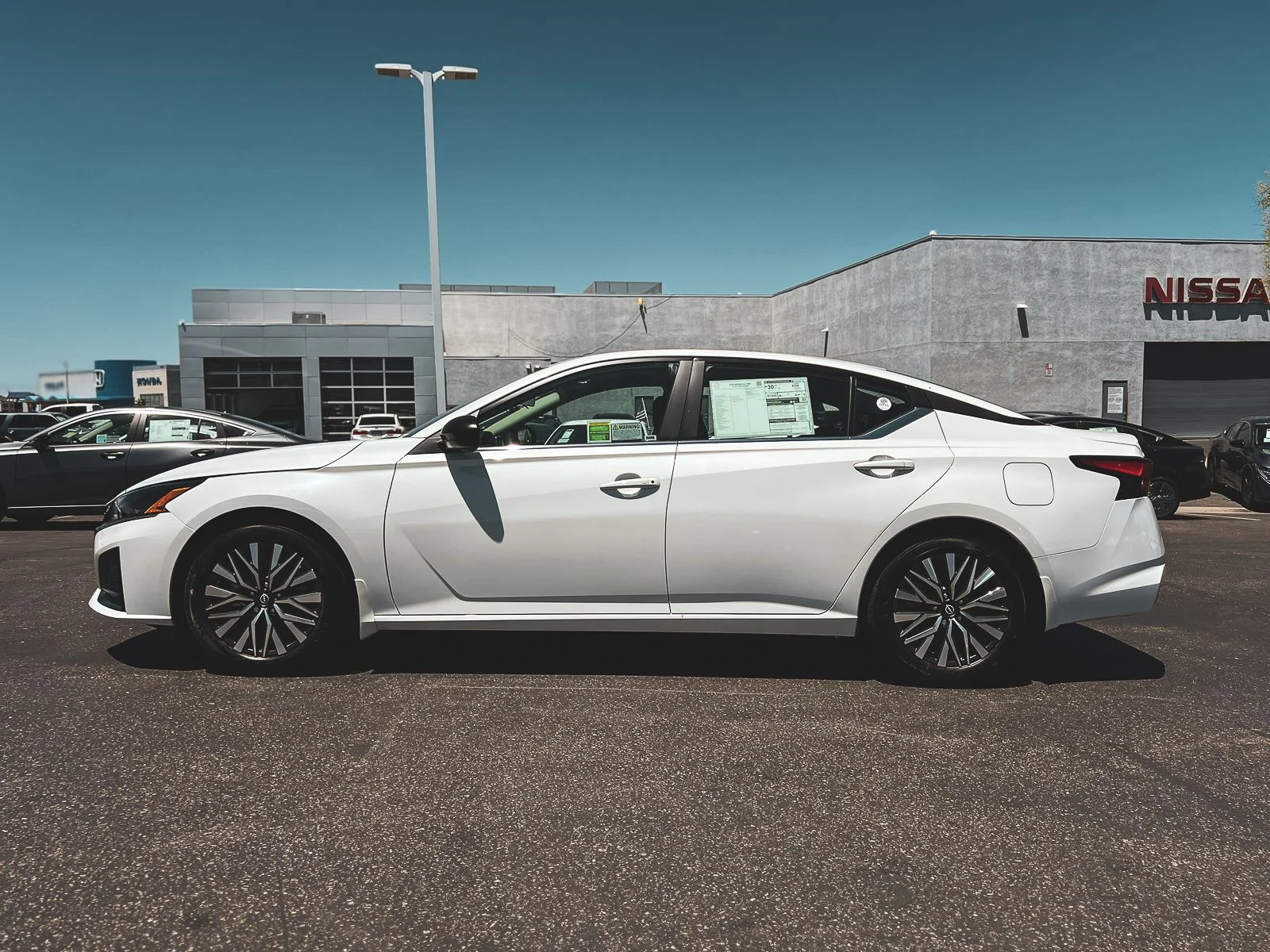 New 2026 Pearl White TriCoat Nissan SV image 4