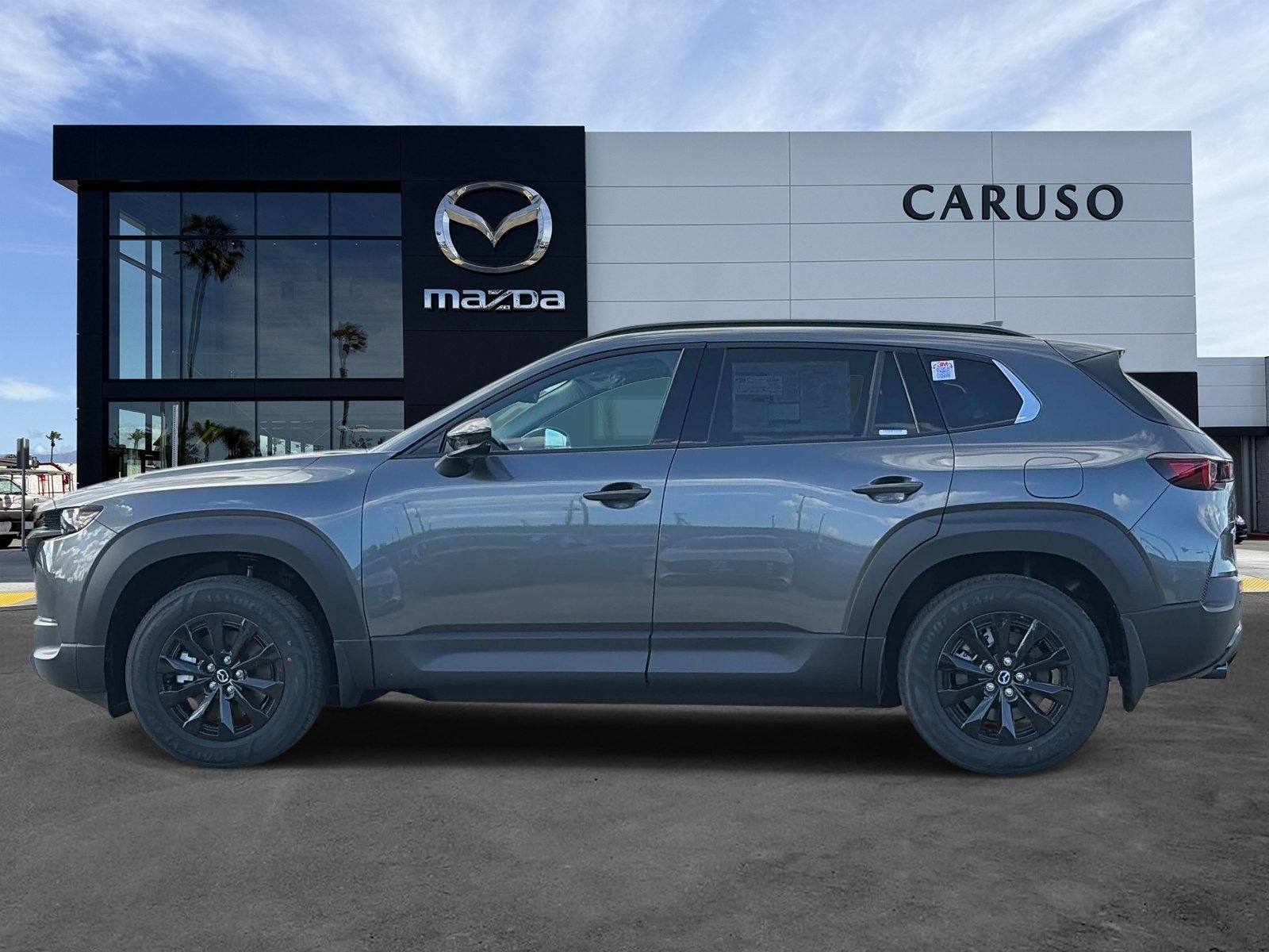 New 2026 Machine Gray Metallic Mazda Premium AWD image 4