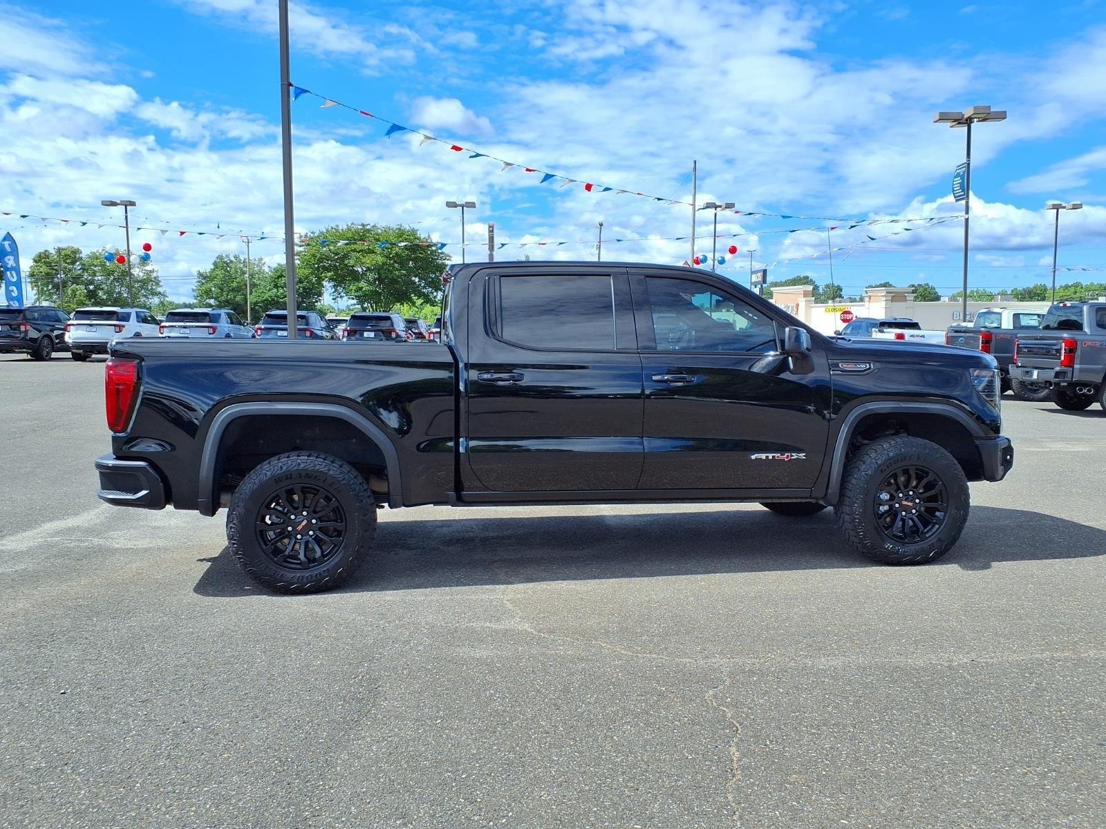 Used 2023 Onyx Black GMC AT4X image 11