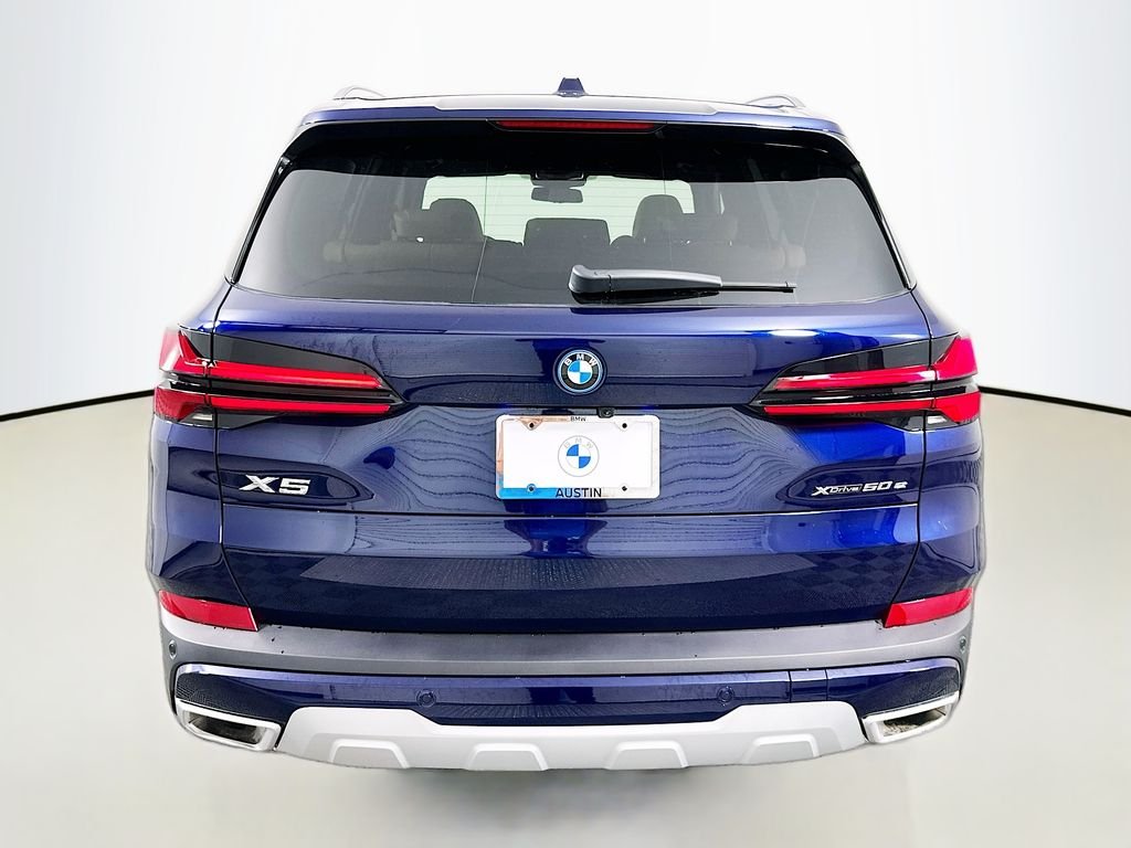 New 2026 Tanzanite Blue II Metallic BMW xDrive50e image 6