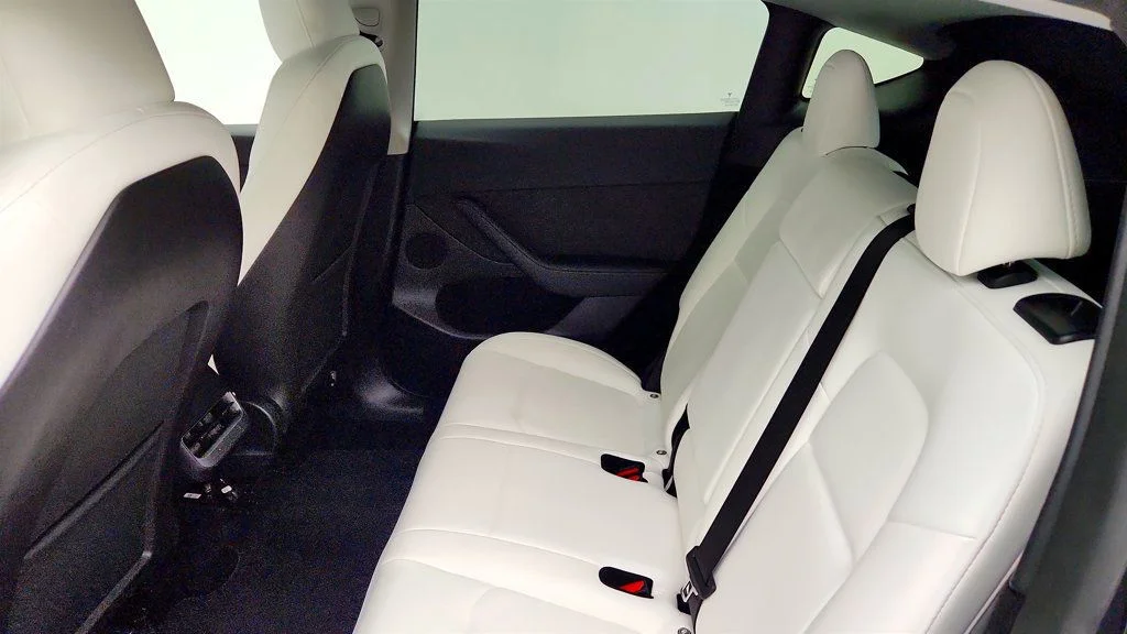 Used 2024 Stealth Grey Tesla Performance AWD w/ White & Black Interior image 25