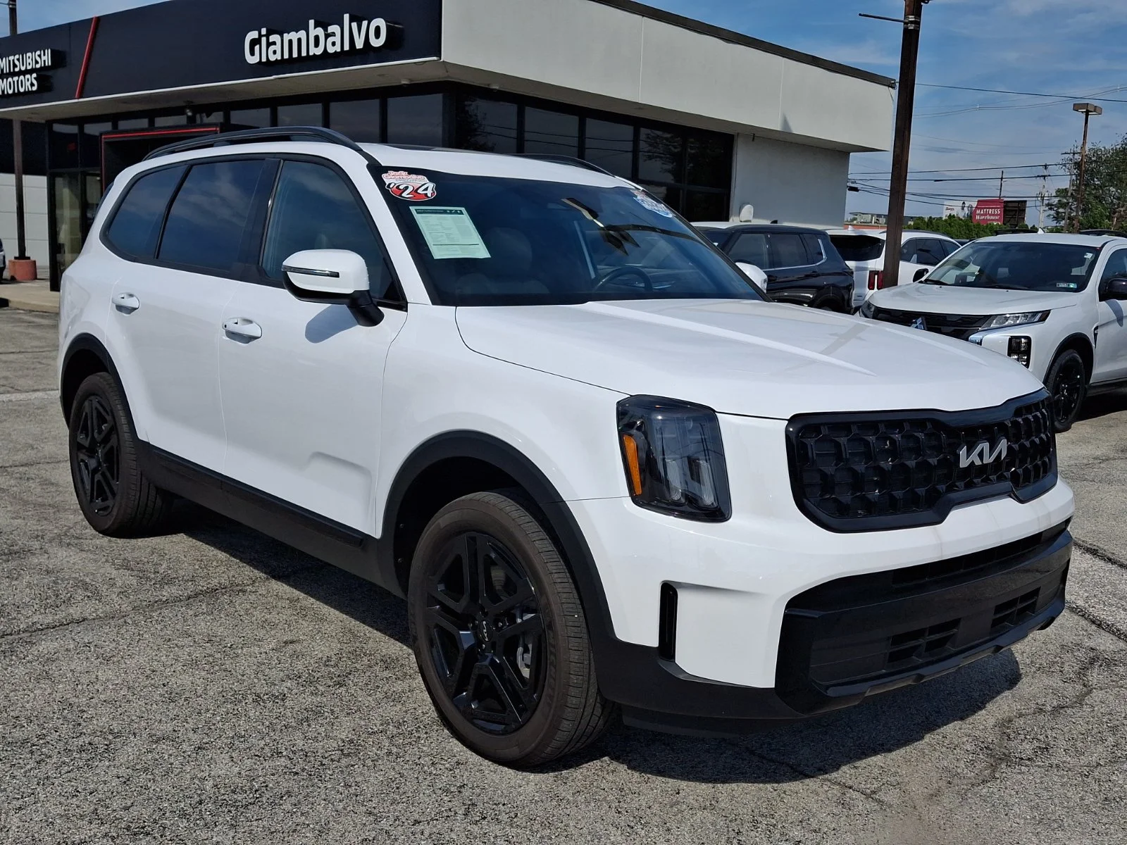 Certified Used 2024 White Kia EX X-Line image 1