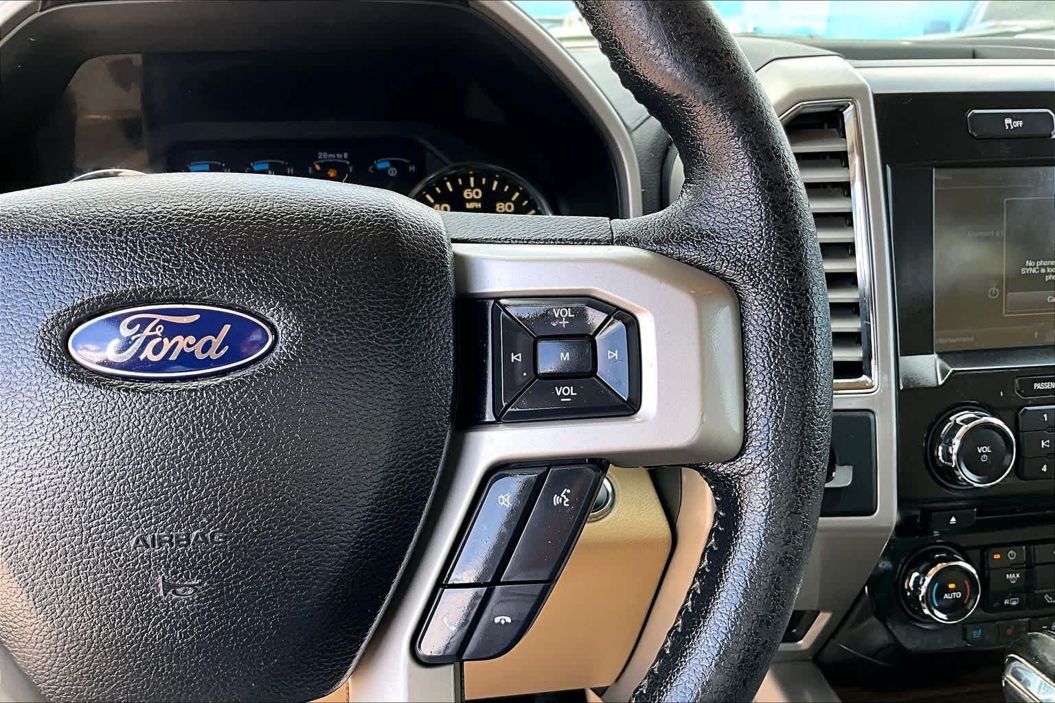 Used 2015 Blue Jeans Metallic/Caribou Metallic Ford Lariat image 24