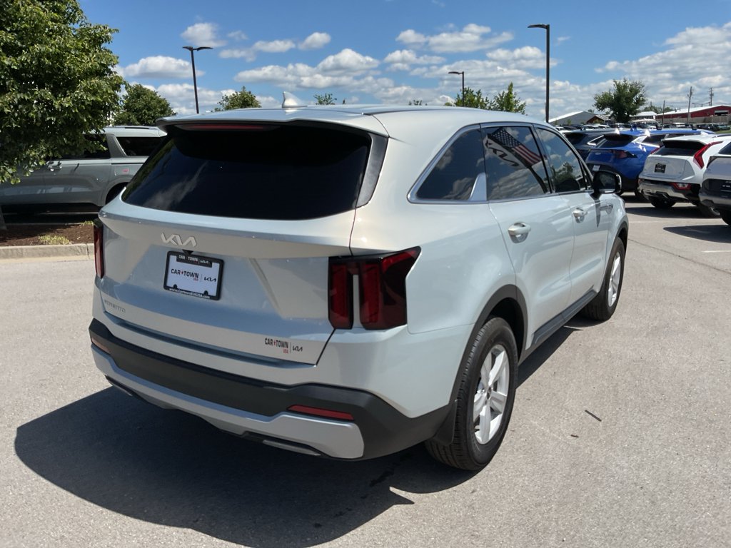 Used 2026 Ivory Silver Kia LX image 9