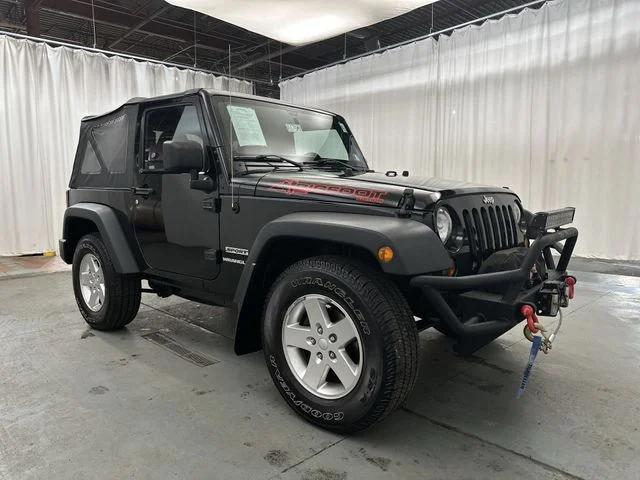 Used 2013 Black Clearcoat Jeep Sport image 12