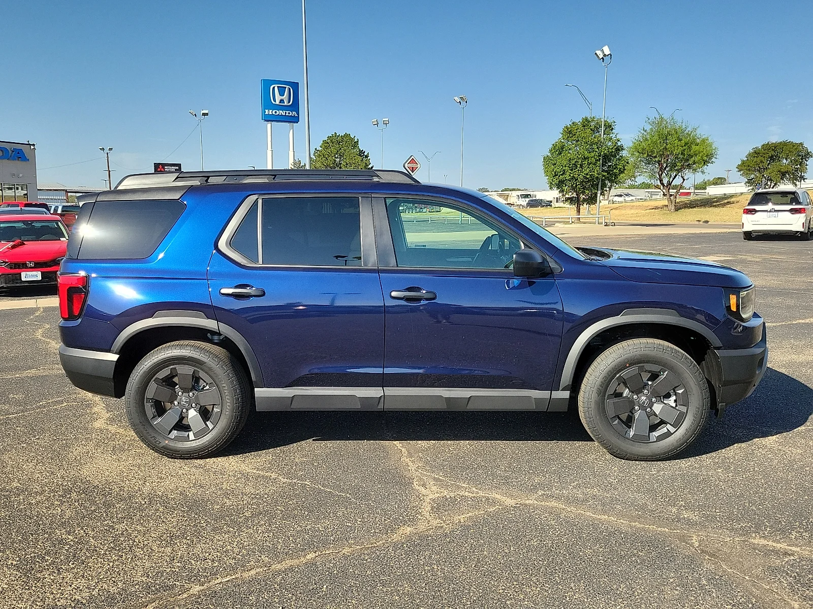 New 2026 Obsidian Blue Pearl Honda RTL image 12