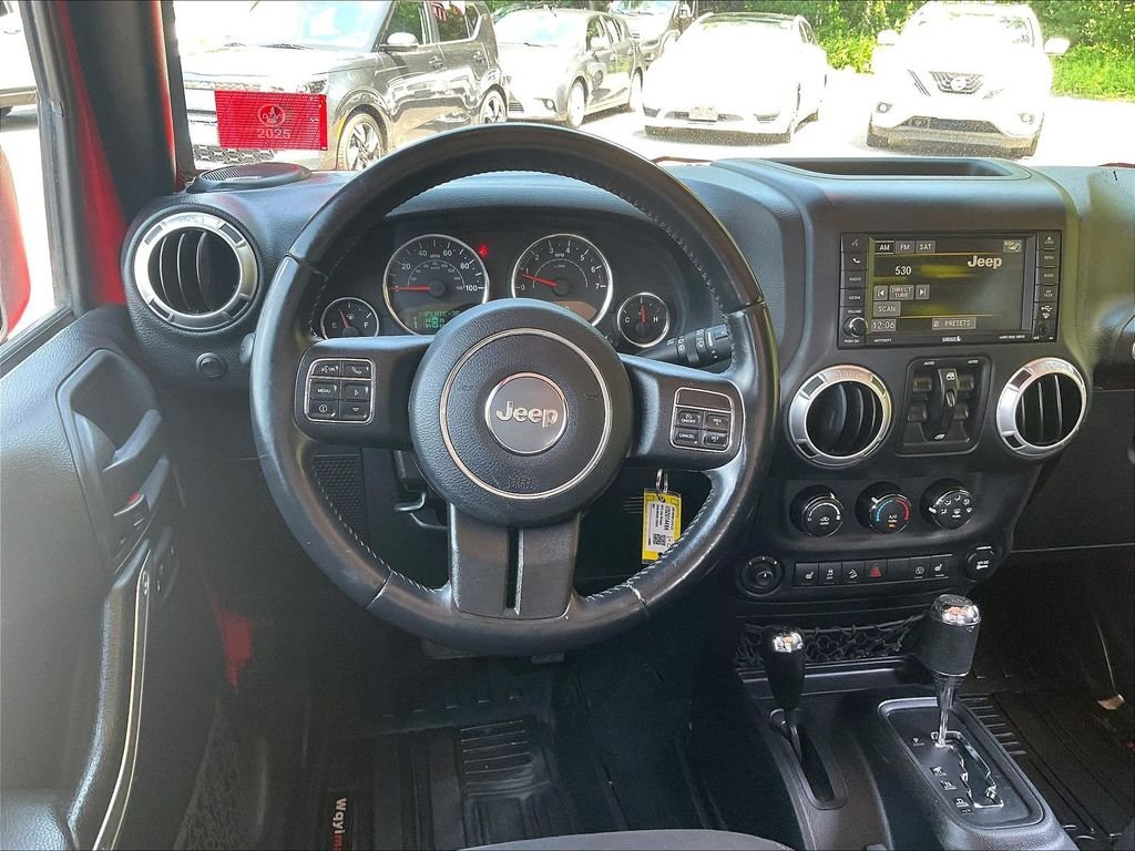 Used 2015 Red Jeep Unlimited Sahara image 16