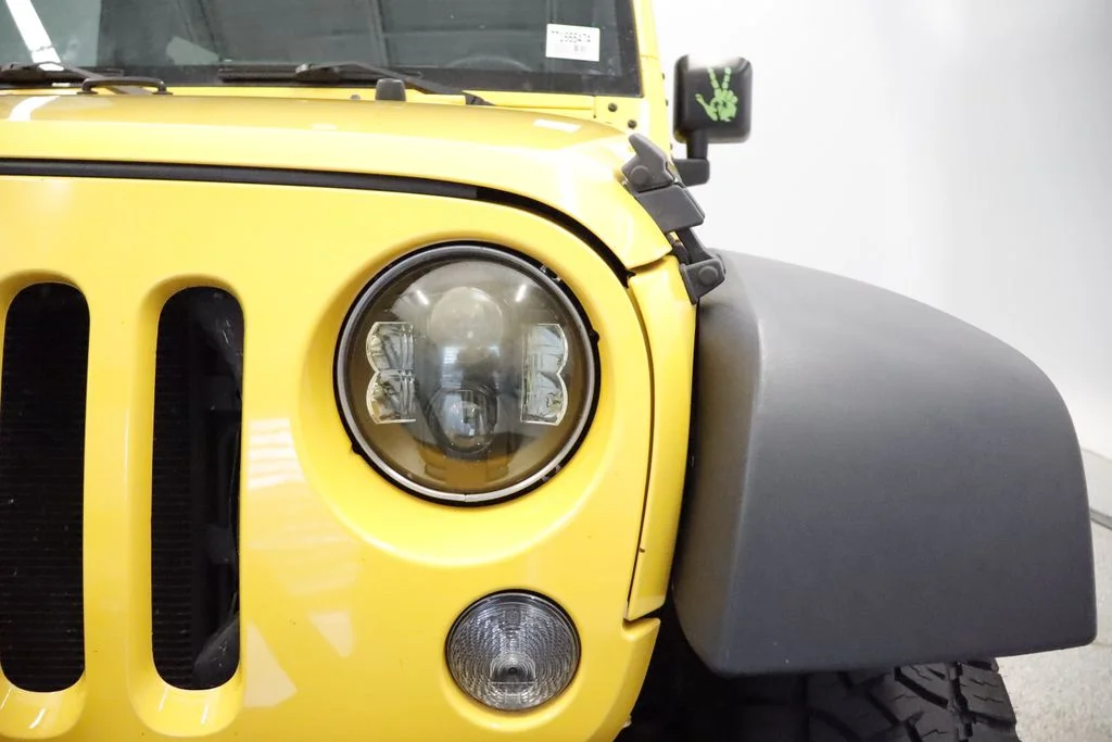 Used 2015 Yellow Jeep Rubicon image 3