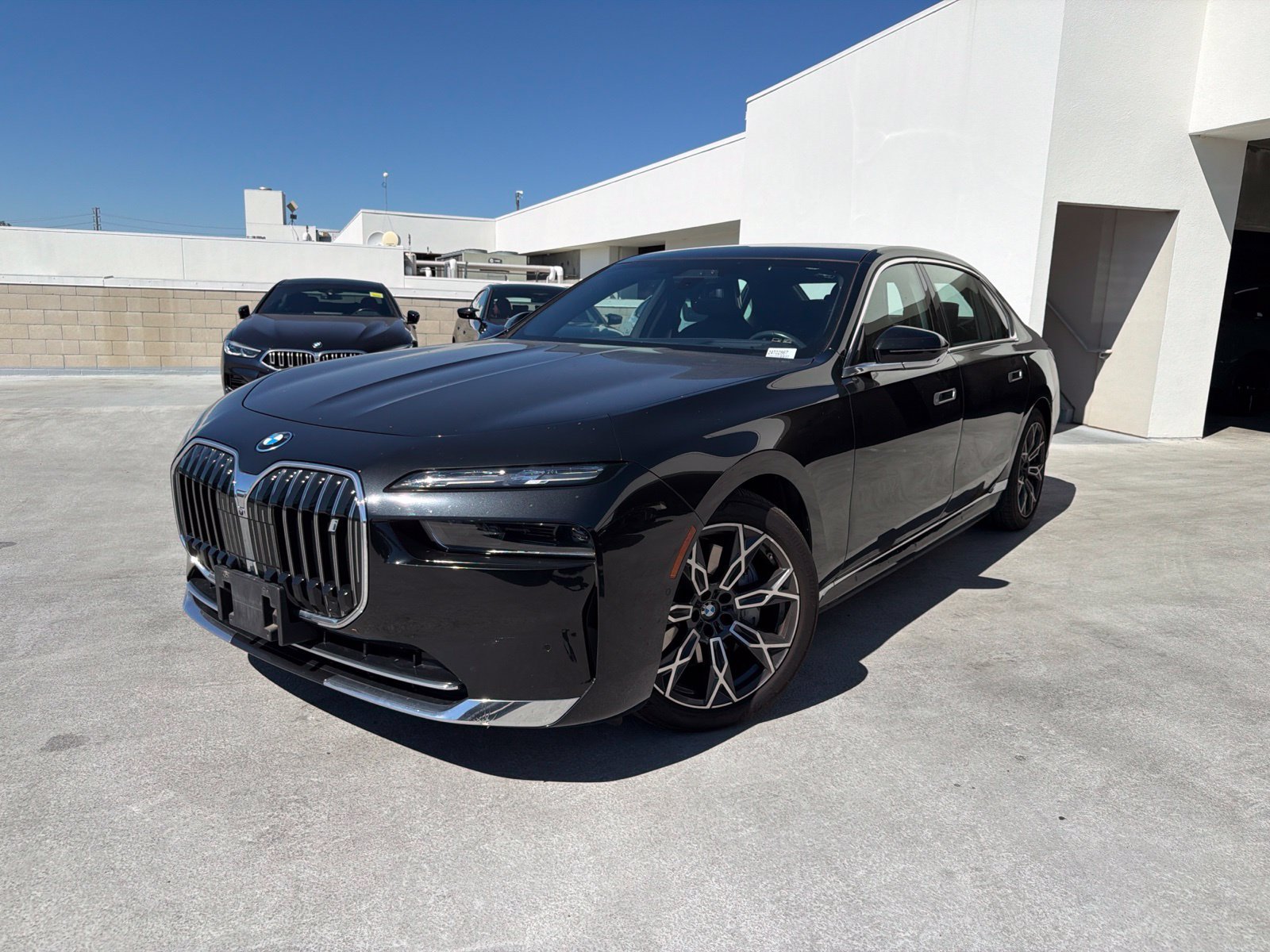 Certified Used 2024 Black Sapphire Metallic BMW xDrive60 image 3
