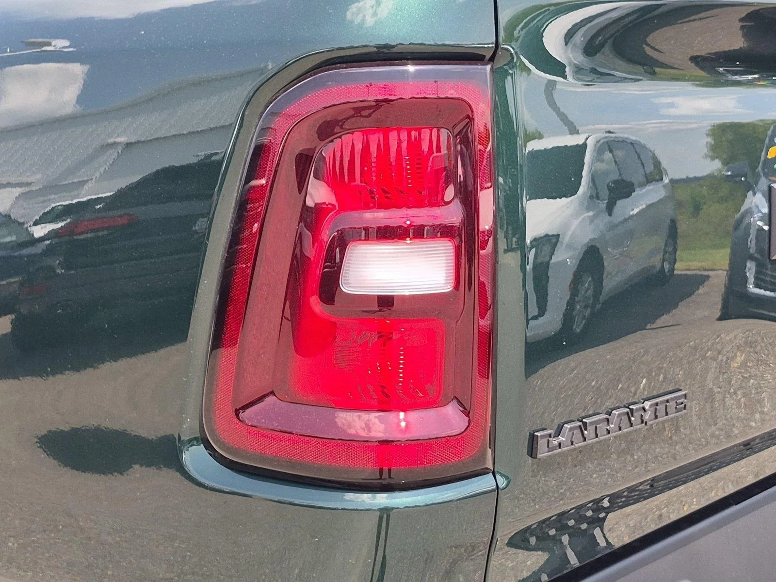 New 2026 Serrano-Green Metallic Exterior Paint RAM Laramie image 12