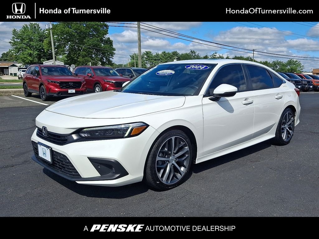 Certified Used 2024 Platinum White Pearl Honda 1.5T 4D TOURING image 1