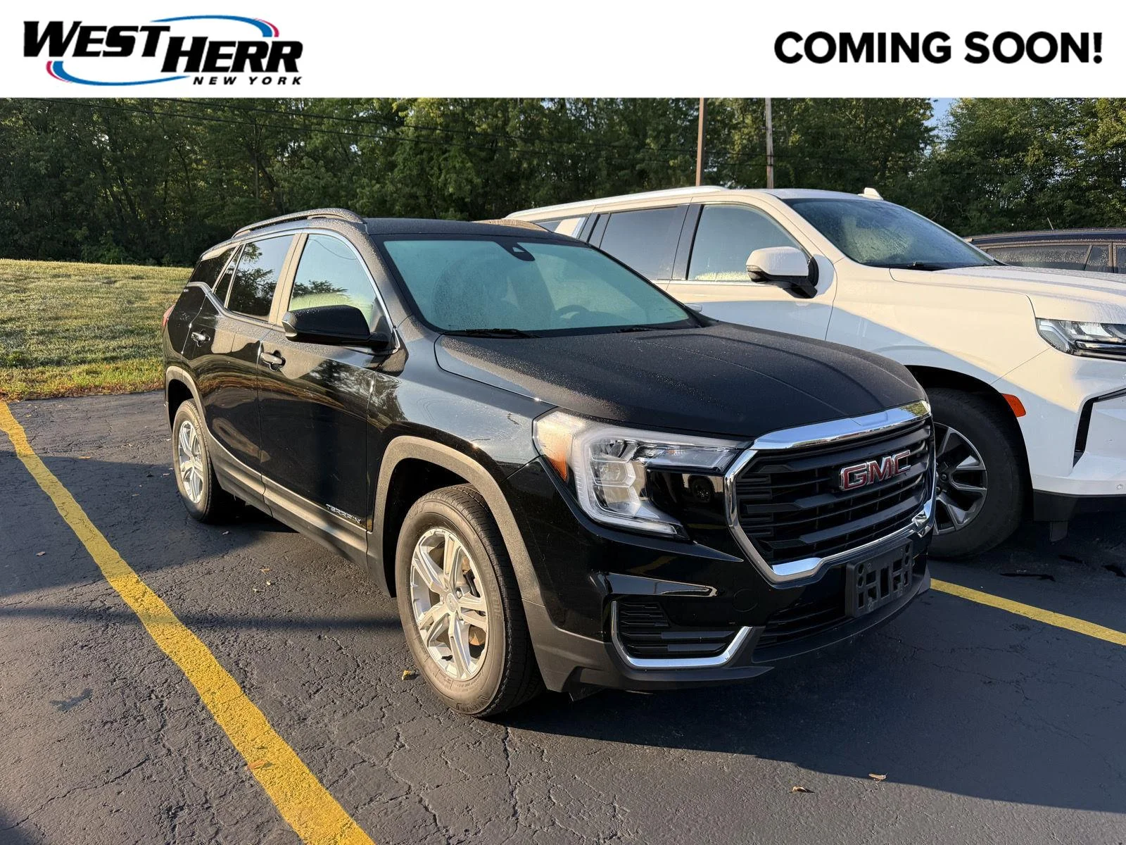 Used 2023 EBONY TWILIGHT METALLIC GMC SLE image 1