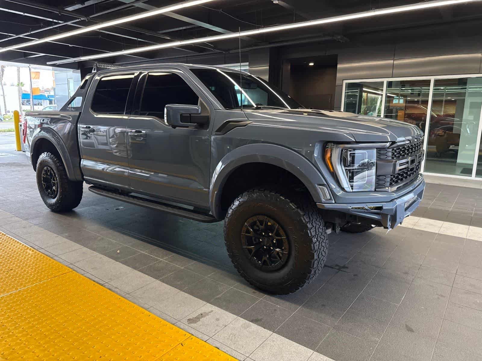 Used 2023 Azure Gray Metallic Tri-Coat Ford Raptor image 10