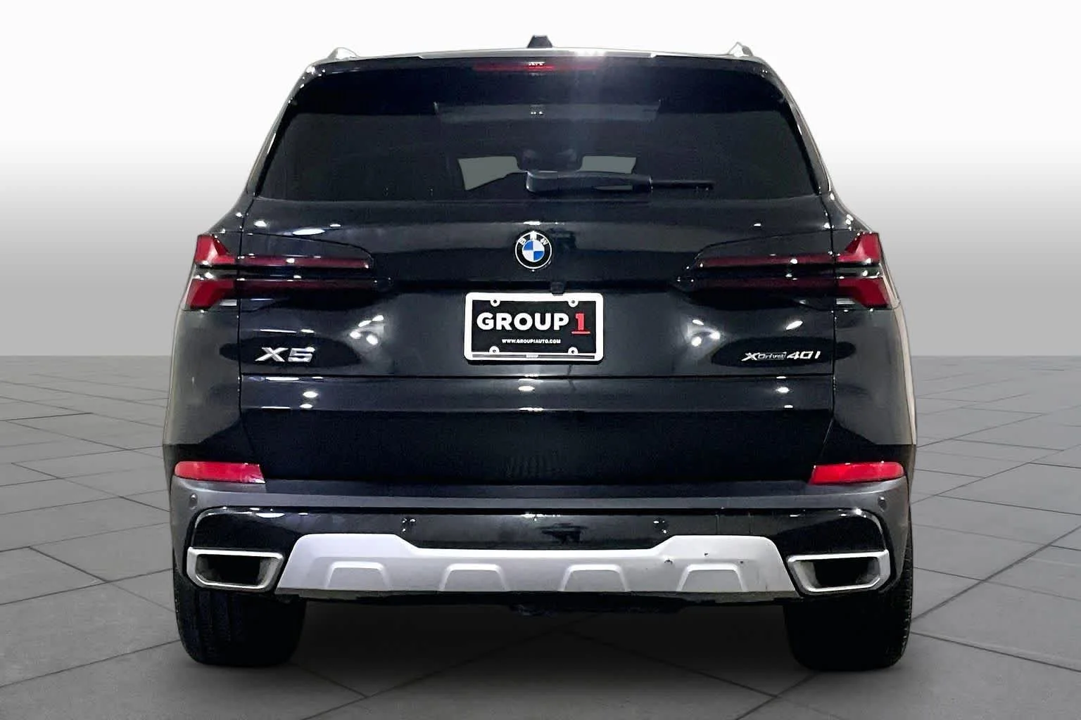 Certified Used 2024 Black Sapphire Metallic BMW xDrive40i image 4
