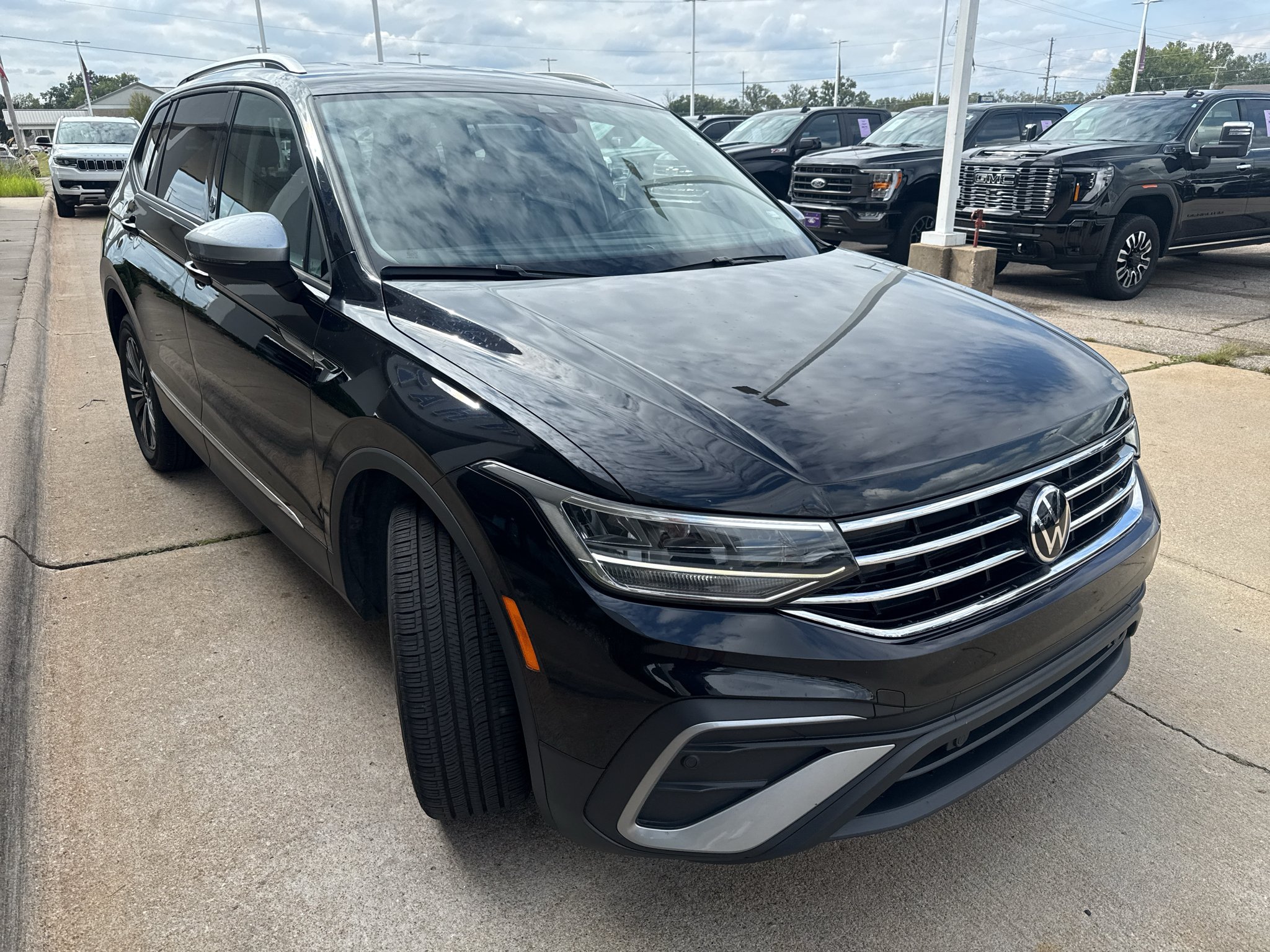 Used 2024 Deep Black Pearl Volkswagen Wolfsburg Edition image 4