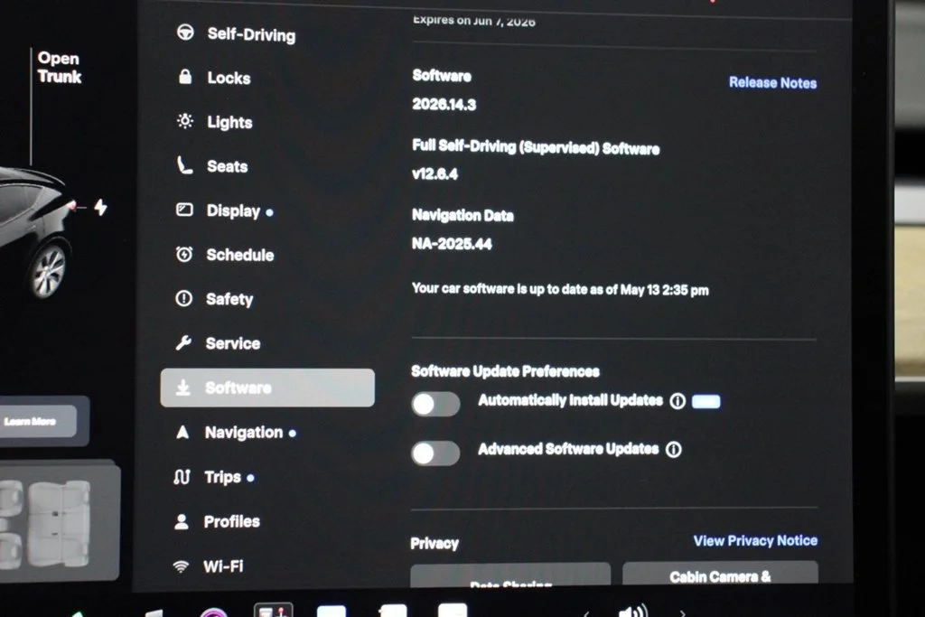 Used 2022 Solid Black Tesla Performance image 25