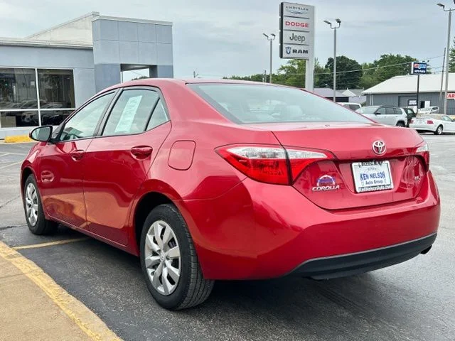Used 2016 Barcelona Red Metallic Toyota LE image 8