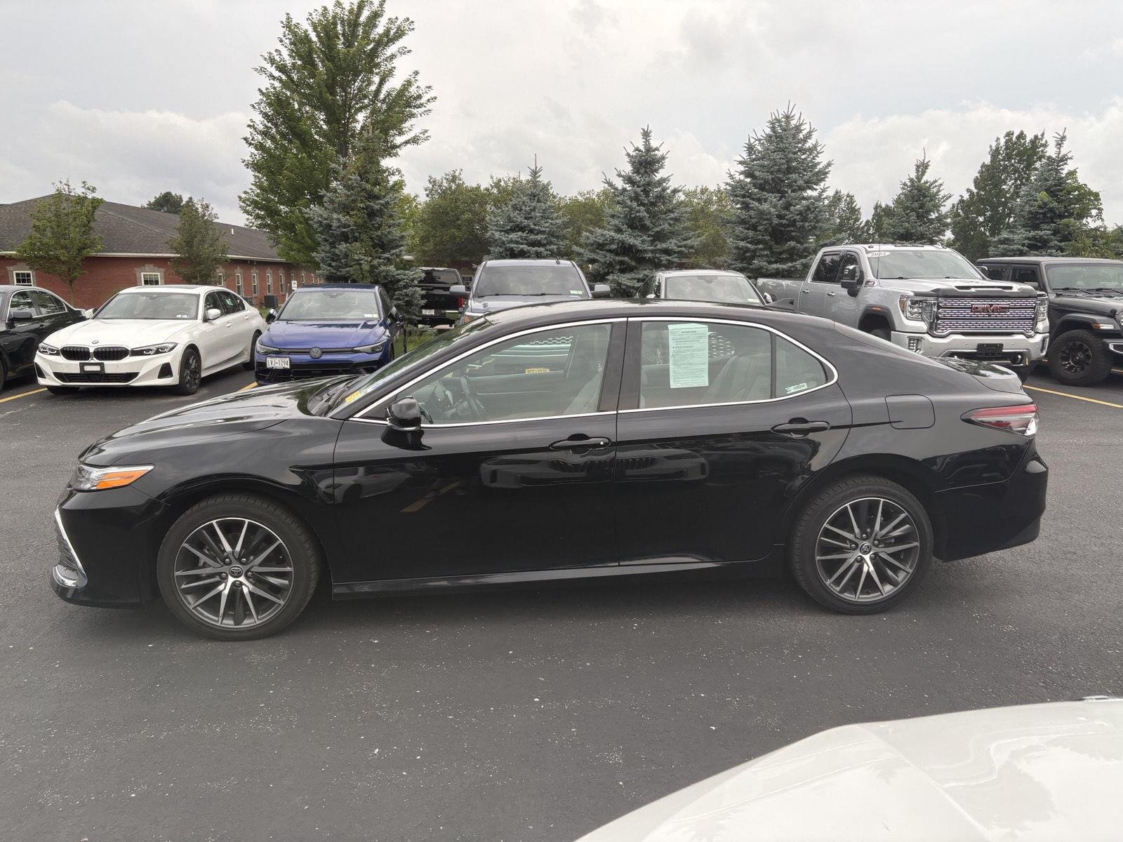 Used 2023 Midnight Black Metallic Toyota XLE image 4