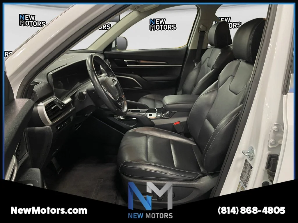 Used 2023 White Pearl Kia S image 9