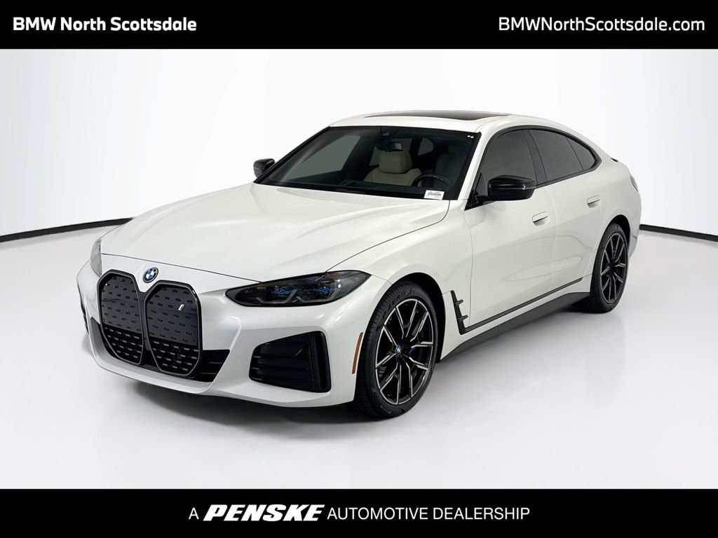 Certified Used 2023 White Metallic BMW eDrive40 image 1