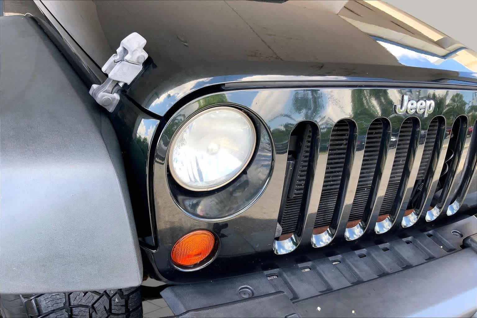 Used 2012 Black Forest Green Pearl Jeep Sport image 26