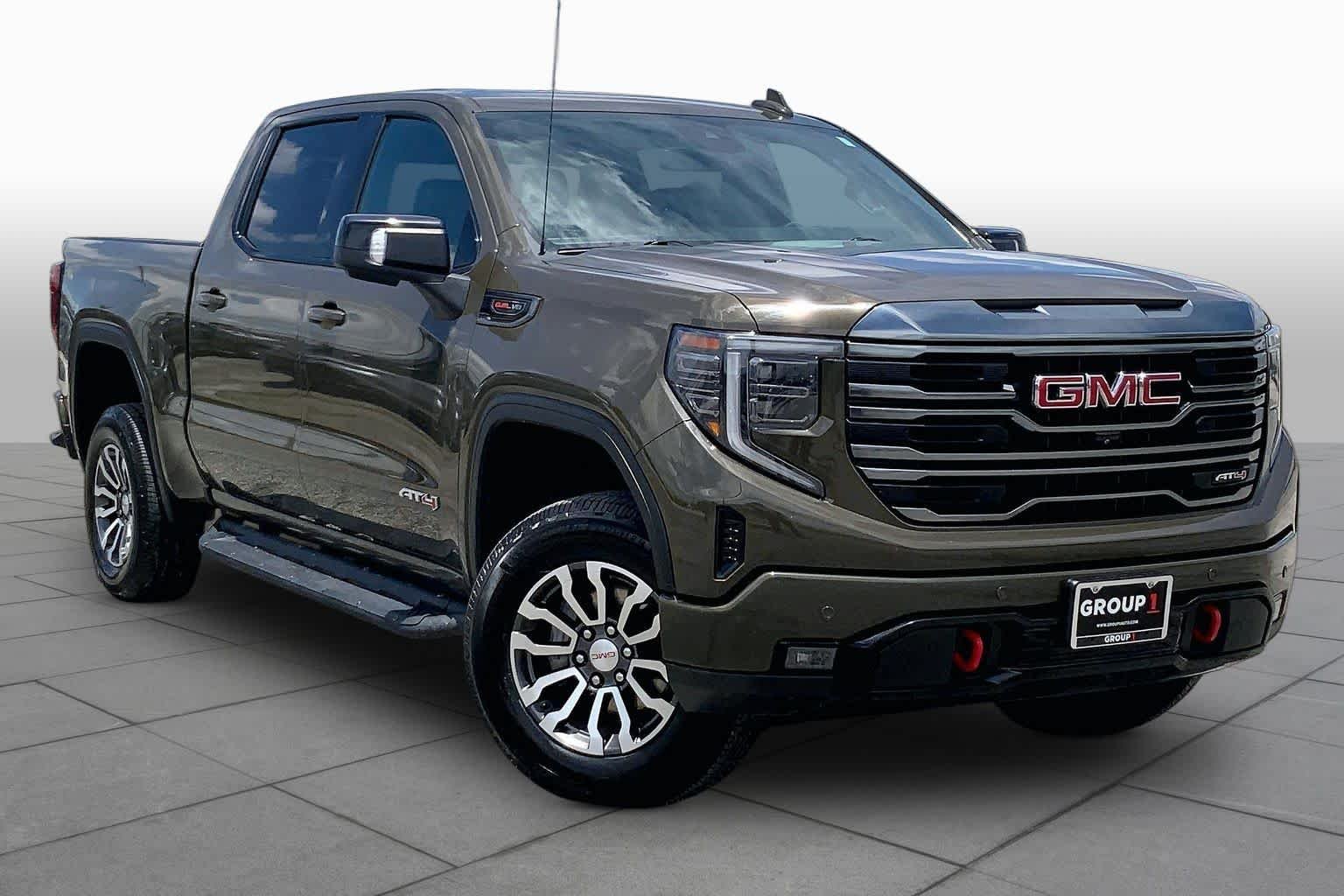 Used 2023 Deep Bronze Metallic GMC AT4 image 3