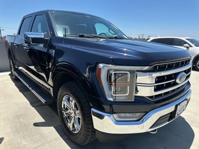Certified Used 2021 Blue Metallic Ford Lariat image 1
