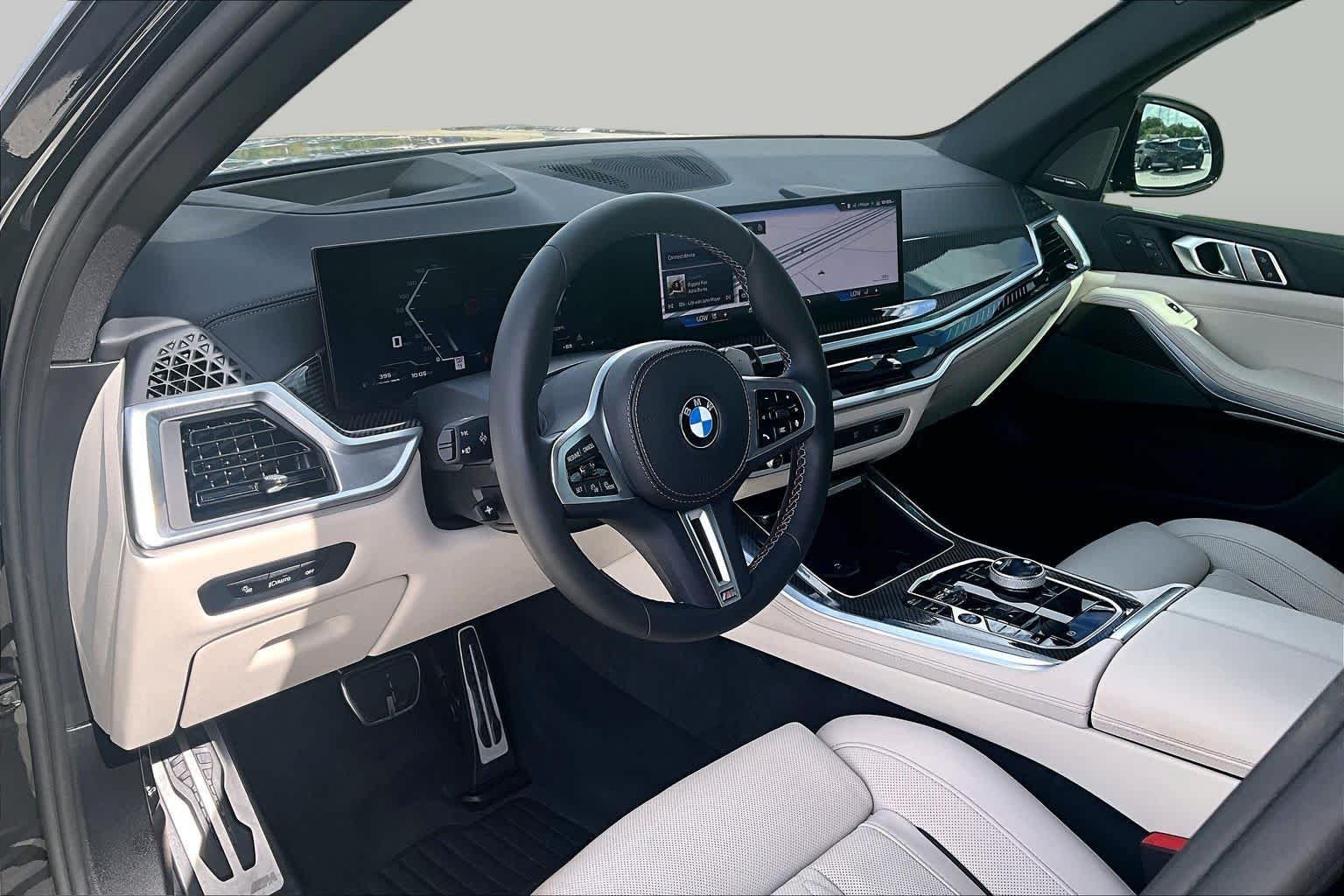 Certified Used 2024 Black Sapphire Metallic BMW M60i image 16