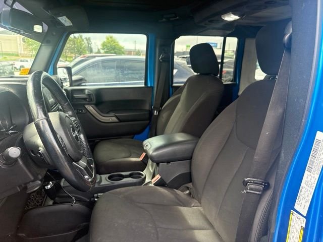 Used 2015 Blue Jeep Unlimited Sport image 9