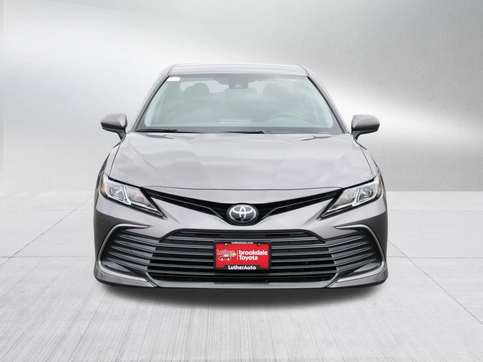 Certified 2022 Toyota Camry LE with VIN 4T1C11BK6NU070497 for sale in Brooklyn Center, Minnesota