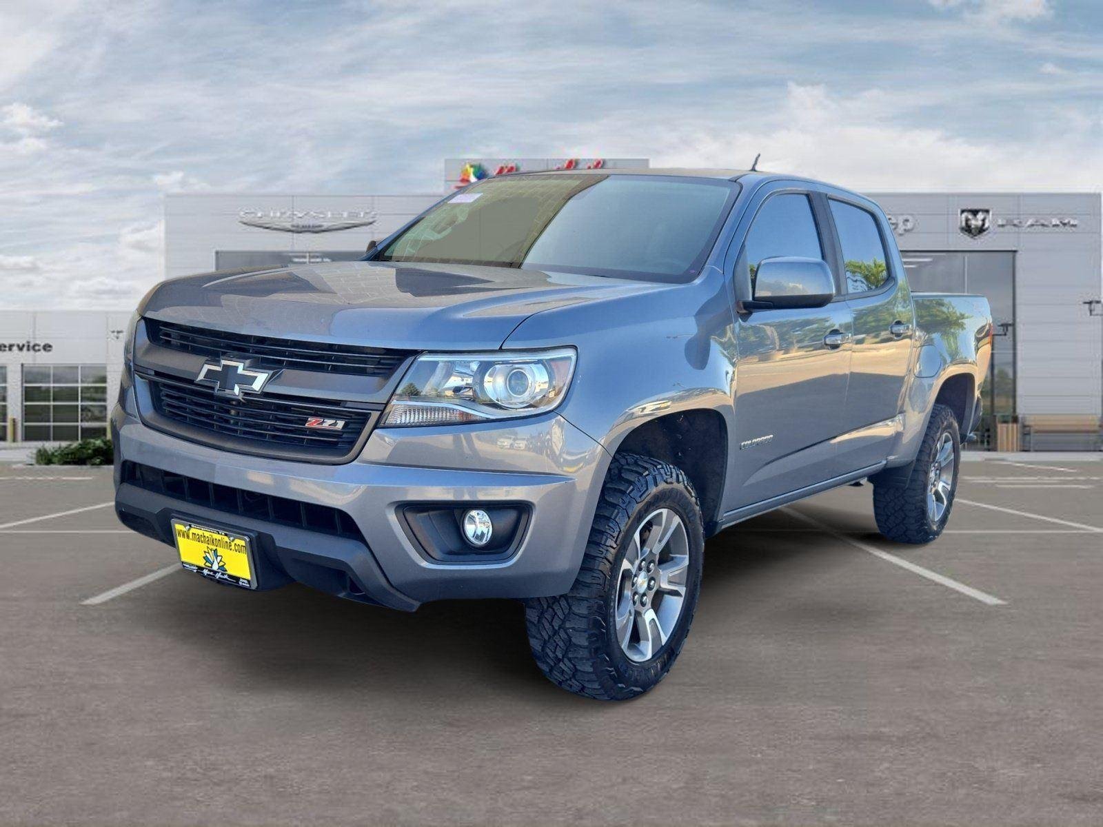 Used 2020 Silver Ice Metallic Chevrolet 4WD Z71 image 1