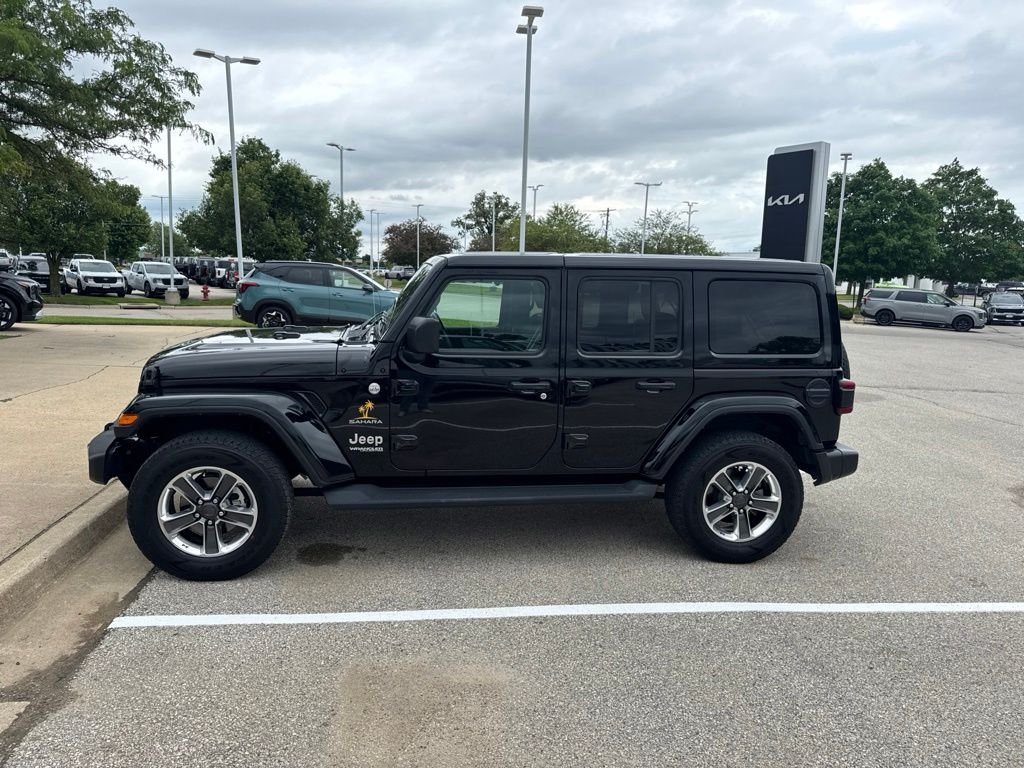 Used 2022 Black Jeep Unlimited Sahara image 4