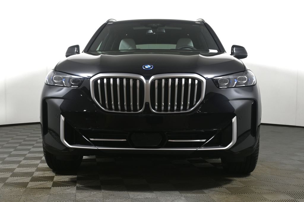 New 2026 Black Sapphire Metallic BMW xDrive50e image 10