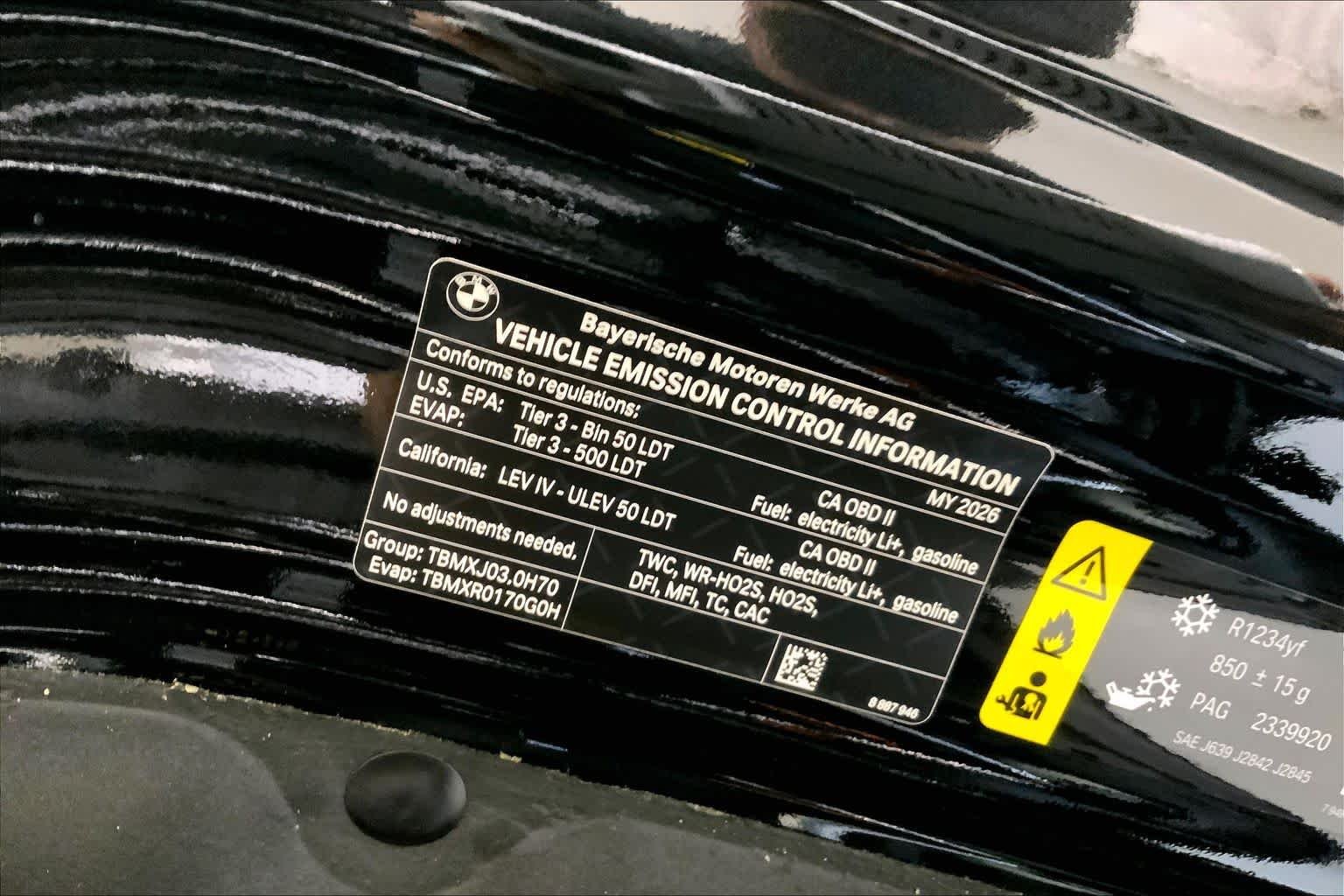 New 2026 Black Sapphire Metallic BMW xDrive50e image 18