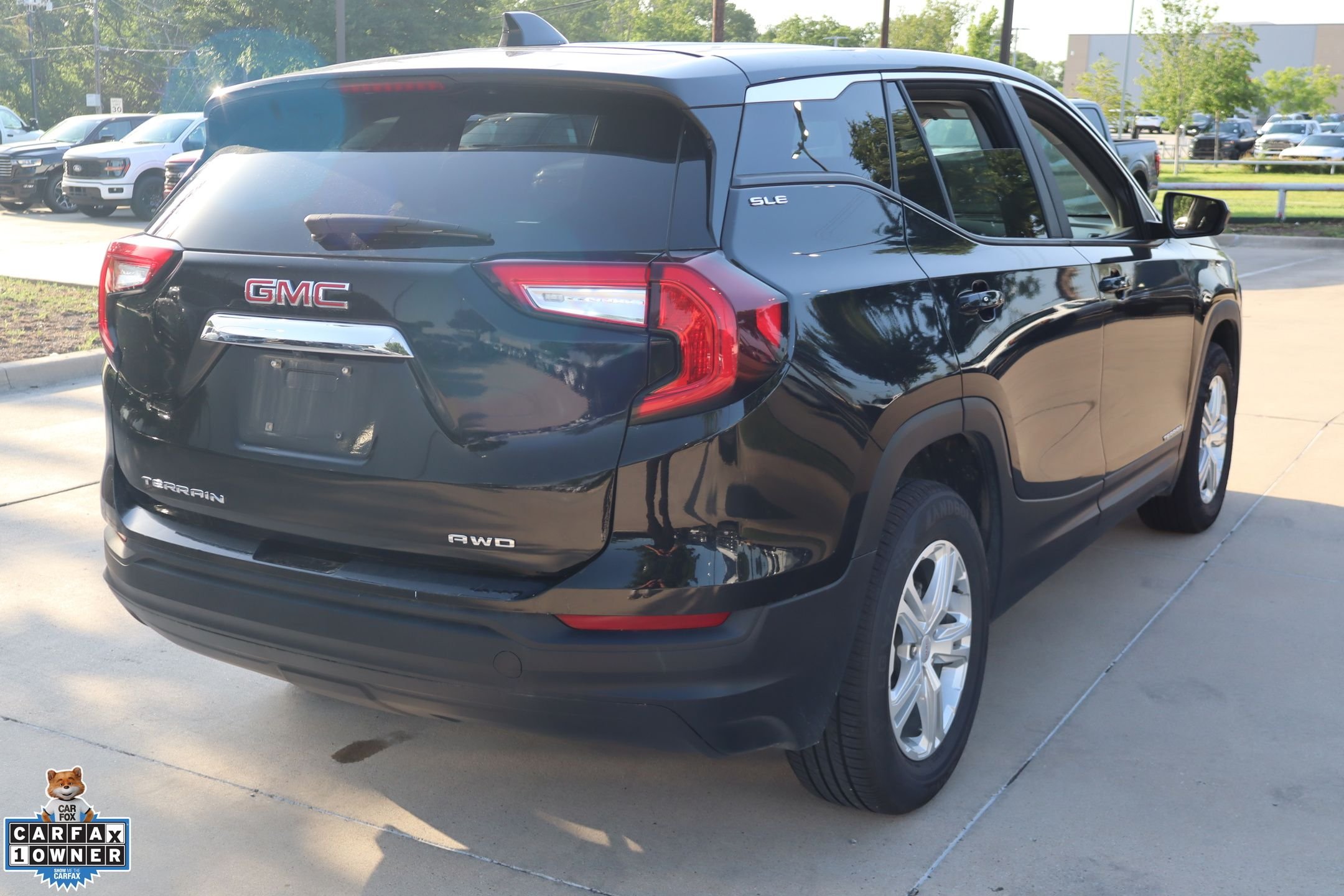 Used 2024 Ebony Twilight Metallic GMC SLE image 3