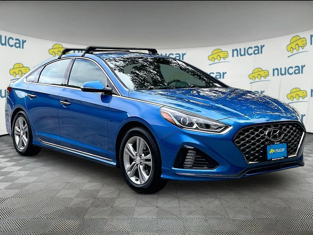 Used 2018 Electric Blue Hyundai Sport image 1