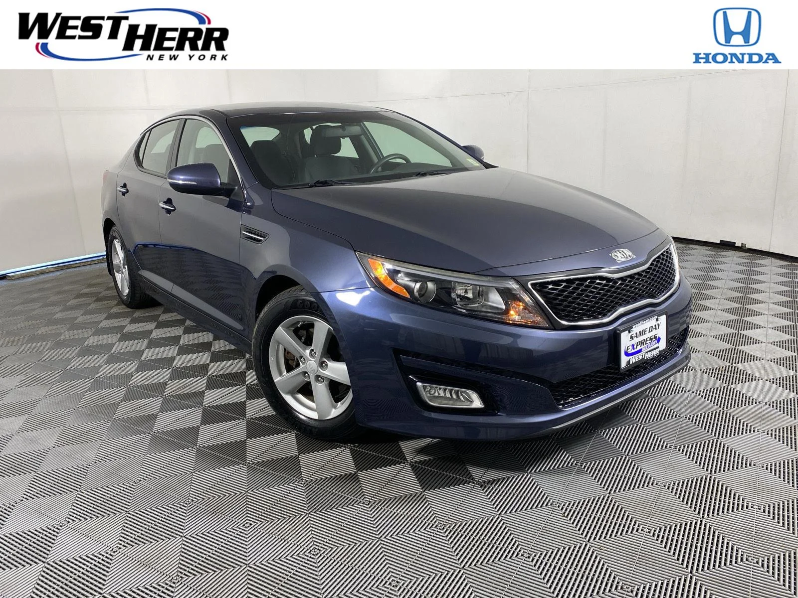 Used 2015 Smokey Blue Kia LX image 1