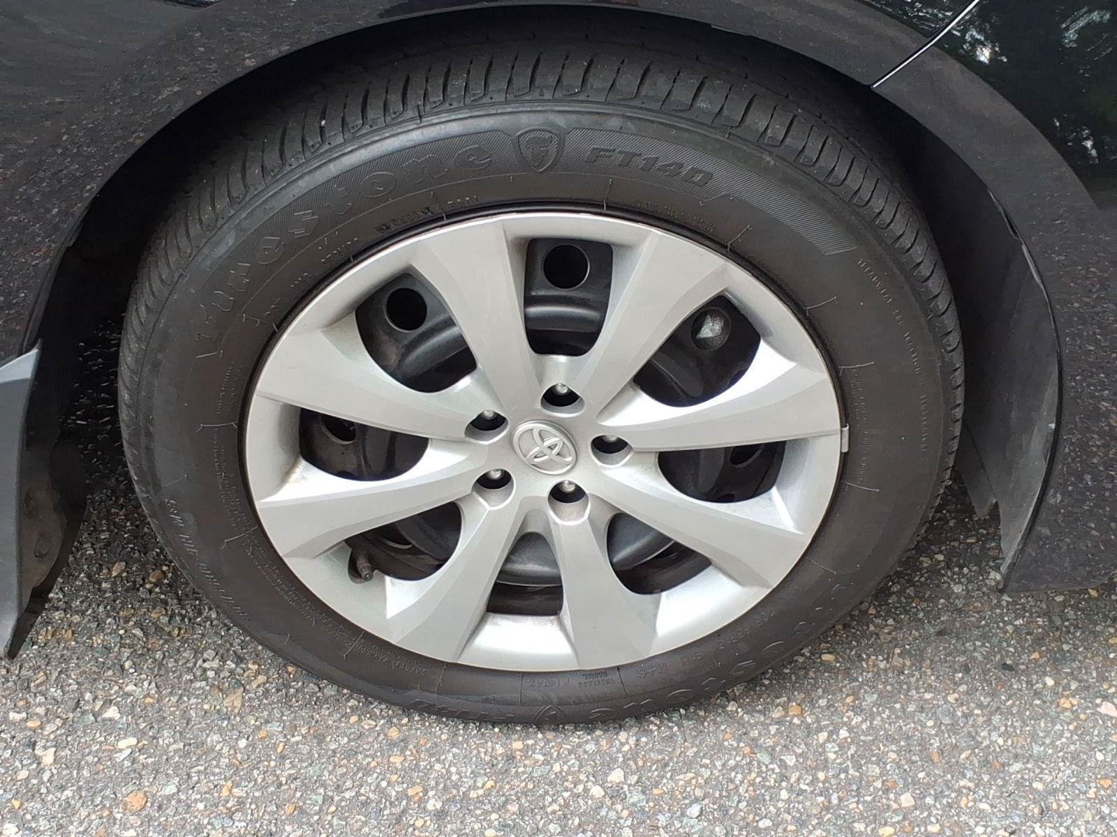 Used 2025 Midnight Black Metallic Toyota LE image 9